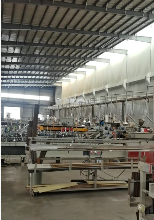 Composite decking board extrusion lines at the GreenLuck WPC factory in Foshan
